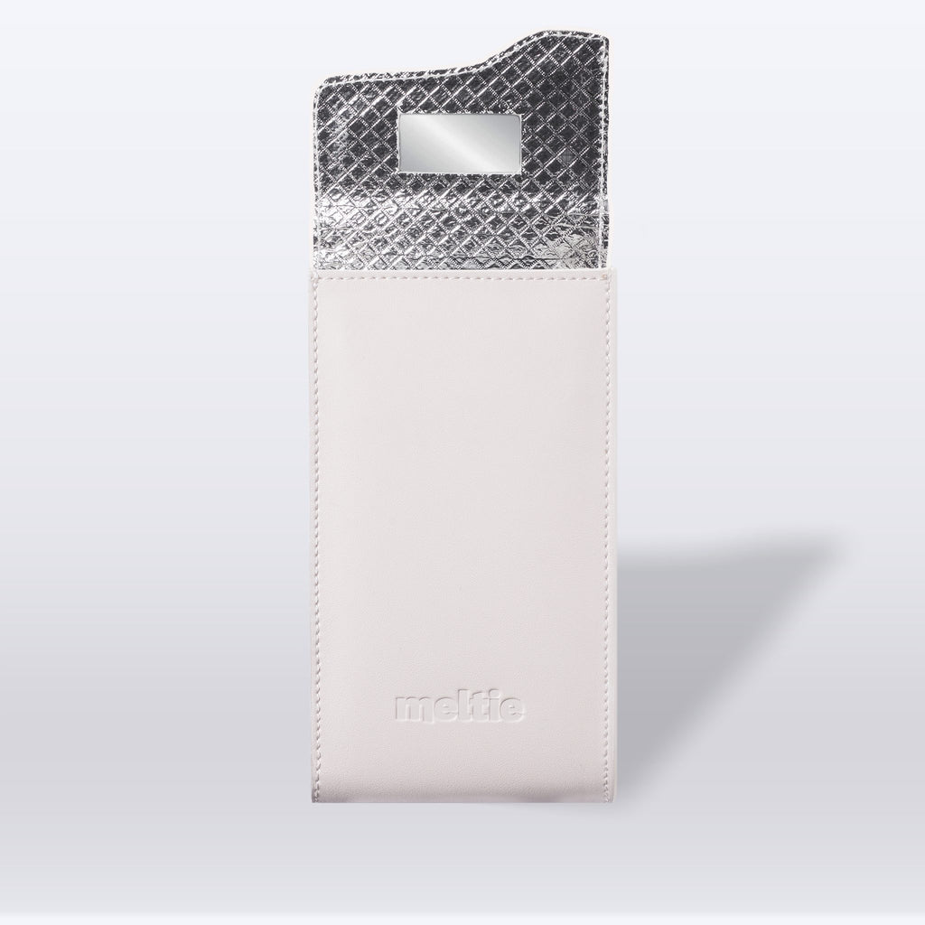 Interior of meltie pocket showing insulated lining and hidden mirror